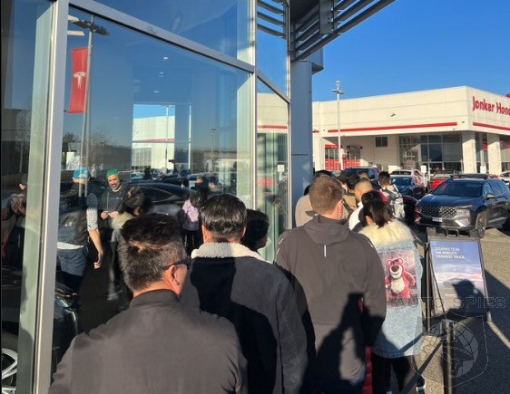 Crowds Form At Tesla Showrooms To See New Cybertruck
